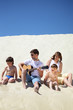 guy in sunglasses plays guitar and  lip accordion  with children