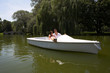 Young attractive couple on boat
