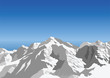 Snow capped mountain against a blue sky