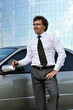 Young businessman standing outdoors
