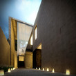 Modern concrete minimalist villa at dusk