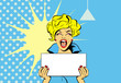 Portrait of a Shocked glamour woman Holding a Blank