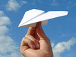 child hand with paper plane child hand with paper plane