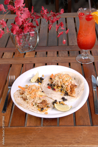 Photo: Two fish taco sandwichs served on plate Two fish taco sandwichs served on plate