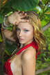 beautiful young blond girl in a red bikini in hawaii