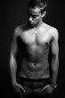 One shirtless masculine sexy young man