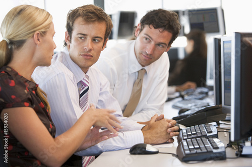 Photo: Stock Trader Team At Work Stock Trader Team At Work