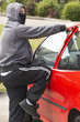 Young Man Breaking Into Car Young Man Breaking Into Car