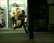 Video: Slowmotion 35mm shot. Man running on the street at night. Slowmotion 35mm shot. Man running on the street at night.