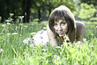 Young smiling girl in grass