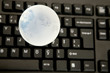 glass globe on keyboard glass globe on keyboard