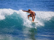 young man surfing at Point Panic, Hawaii young man surfing at Point Panic, Hawaii
