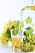 Grape juice been poured into glass