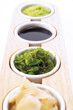 Sushi ingredients: soy sauce, ginger and wasabi