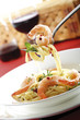 Spaghetti with prawns on plate