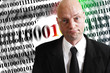 Business man in front of numerical series
