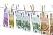 Euro notes on washing line, close-up