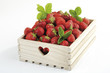 Strawberries in wooden box, close-up