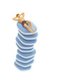 Man in trunks sunbathing on a stack of pills