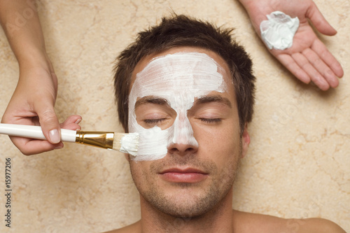 Photo: Germany, man getting a facial, close-up Germany, man getting a facial, close-up