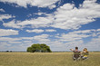 Africa, Botswana, Tourists looking at the landscape