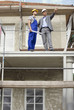 Architect and construction worker on site