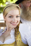 Photo: Germany, Bavaria, Upper Bavaria, Young woman in traditional costume, smiling, portrait, close-up Germany, Bavaria, Upper Bavaria, Young woman in traditional costume, smiling, portrait, close-up