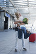 Germany, Leipzig-Halle, Airport, Couple embracing