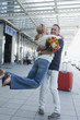 Germany, Leipzig-Halle, Airport, Couple embracing