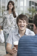 Germany, Cologne, People sitting in cafe