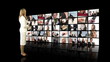 Woman standing in front of TV Screen