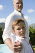 Man standing with his son