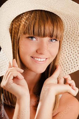 Photo: Young girl in a hat Young girl in a hat
