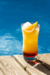 Tequilla Sunrise Cocktail by the Pool Tequilla Sunrise Cocktail by the Pool