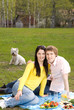 Photo: Young couple at romantic picnic Young couple at romantic picnic