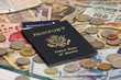 Passport with Foreign Money and Plane Tickets, Focusing on Passp