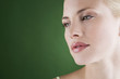 A portrait of a young blonde woman thinking