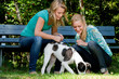 Two sisters and a dog Two sisters and a dog