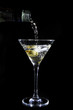 Martini being poured into a glass