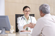 Photo: female doctor and patient female doctor and patient