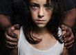 Dirty hands on a girl's shoulders