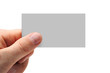 Hand with a business card isolated