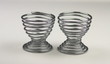 two spiral metal egg cups