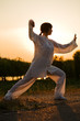 Foto: woman in white suit make's taiji chuan exercise - 7 woman in white suit make's taiji chuan exercise - 7