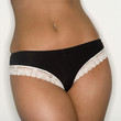 Mid section view of a woman wearing lingerie, close-up