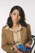 Young woman holding purse, portrait