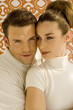 Young couple smiling, close-up