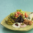 Greek starters, feta cheese, taramas, tsatsiki and pickled vegetables