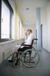 Woman sitting in a wheelchair