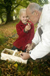 Photo: Germany, Baden-Württemberg, Swabian mountains, Grandfather and granddaughter searching mushrooms in the forest, portrait Germany, Baden-Württemberg, Swabian mountains, Grandfather and granddaughter searching mushrooms in the forest, portrait